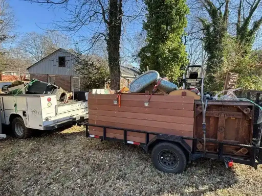 Trailer loaded with household items during an estate cleanout in Lubbock